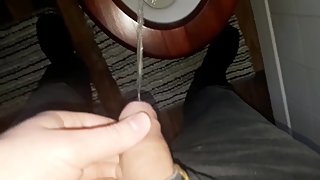pissing in the bathroom