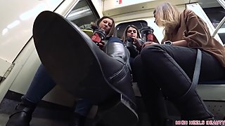 Brunette BRAT in black riding boots