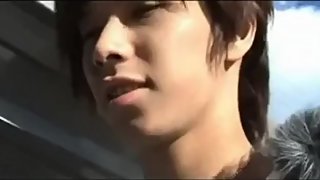 Young Asian Boy in Car