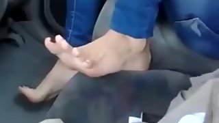 Beautiful feet in the car
