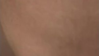 Young boy wet in trackpants