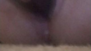 Pregnant girl makes herself creamy with a bottle