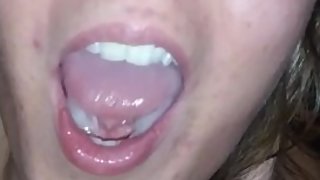 Tatted teen swallows cum