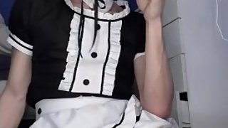 Femboy maid sucks on dildo