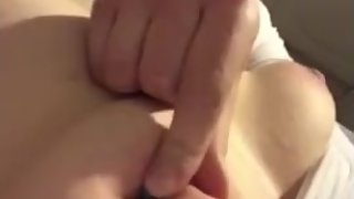 Submissive whore puts pushpins in her tits